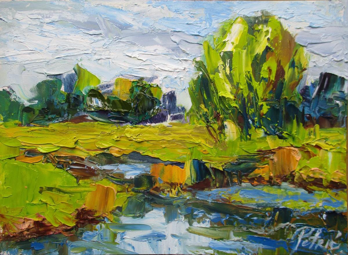 By the river