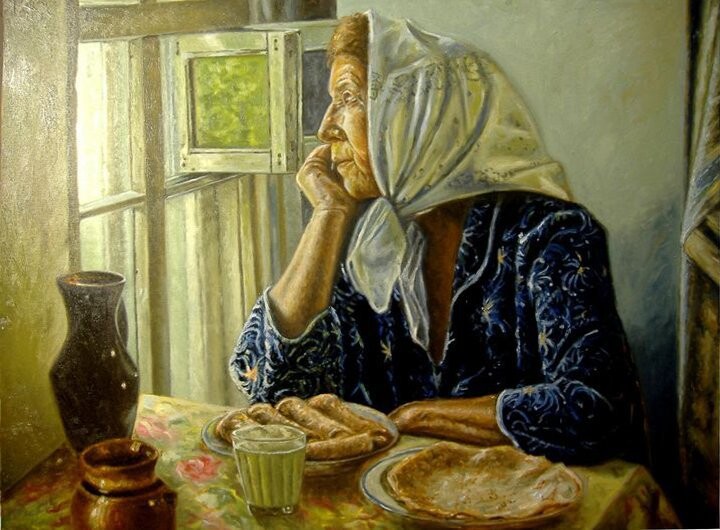 Old woman at the table